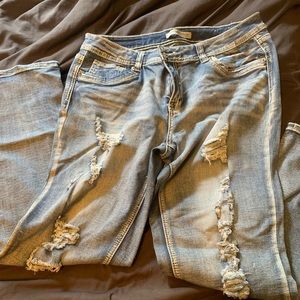 Boot cut distressed jeans